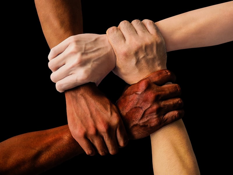 Hands holding hands for support